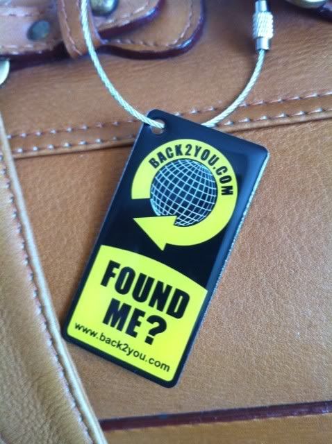  black fabric lining, small detachable leather, makeup/money pouch, 