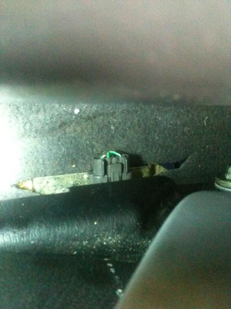 mystery passenger seat plug, and mystery plugs underneath Nissan